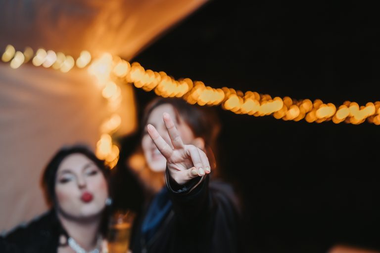 Dancing and peace sign